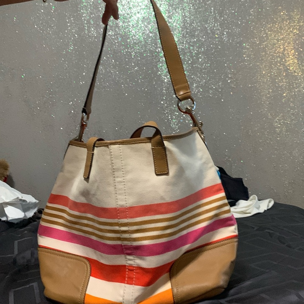 Coach canvas leather bottom